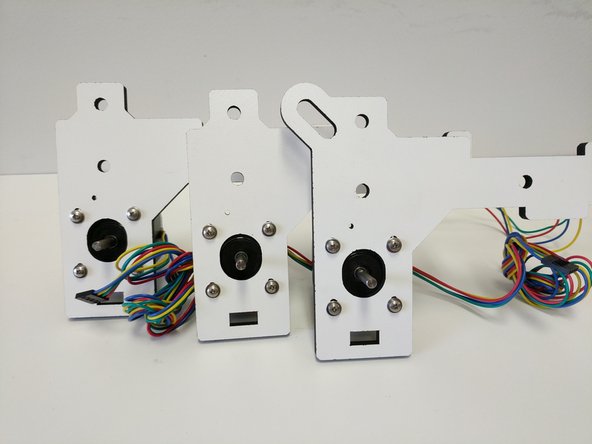 Each stepper Motor is attached with the wires exiting towards the XY or Z tower labeling. using (4) M3 x 10mm machine screws and (4) #4 washers.