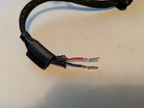 Insert the wires and loom into the boot and slide the boot up the whip as shown in Pic 3.