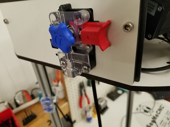 Install the EZR plate using the SHCS 10/32 cap screws on the side panel between the X and Z towers.