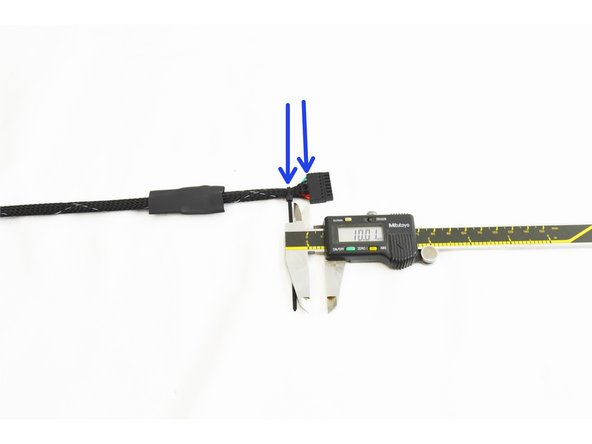 Slide the mesh loom down on the wires so it is approximately 5mm from the Pluggable 8 position Push-In Wire Terminal Plug.
