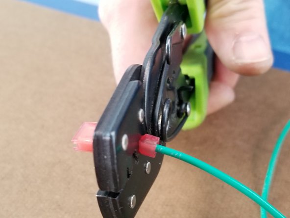 Crimp the spade connector to the wire making sure you have a sold crimp.