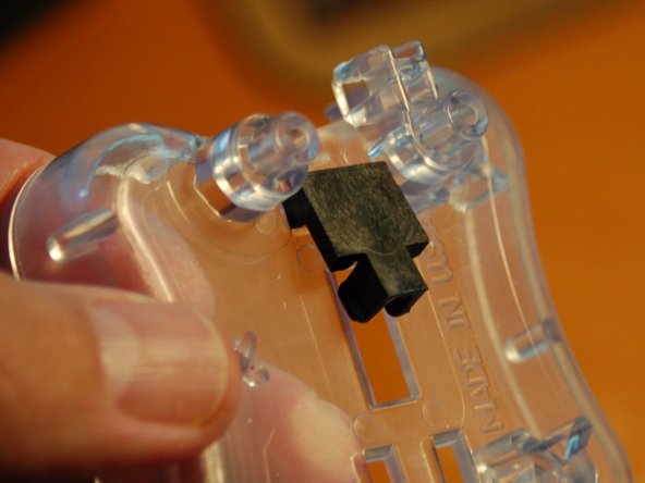 Start by attaching a clip to the &quot;top&quot; belt end.  The clips have two &quot;legs&quot; that fit into square holes above the belt opening.  Fit the belt clip over the belt with the legs hooked into those holes.  Rotate the belt clip &quot;in&quot; and the tabs on the clip sides will engage the sides of belt opening.