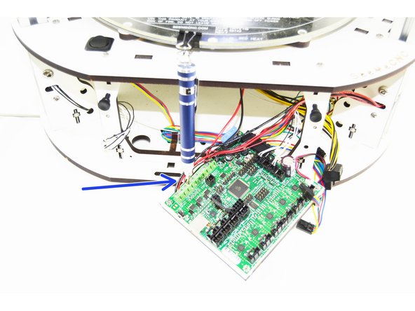 Loosen and remove ONLY the wire from the Fan 0 + terminal on the top of the RAMBo board.
