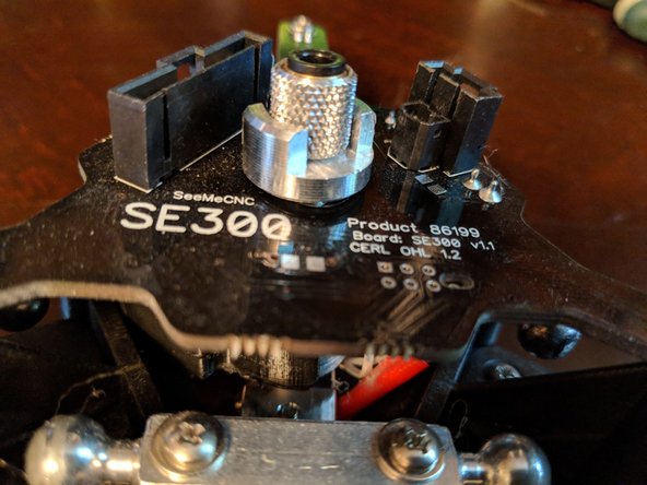 Remove the adapter from the hotend by unscrewing it and remove the old PTFE liner from the hotend. Figure 3.