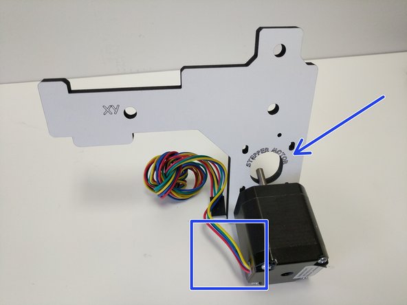 The stepper motors should be mounted so the body of the stepper motor covers the &quot;Stepper Motor&quot; text on the laser cut pieces.