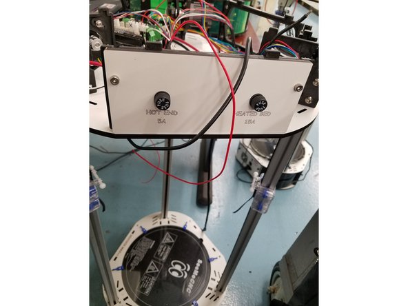 Install the Fuse Panel on the injection molded side panel between the Y and Z towers.