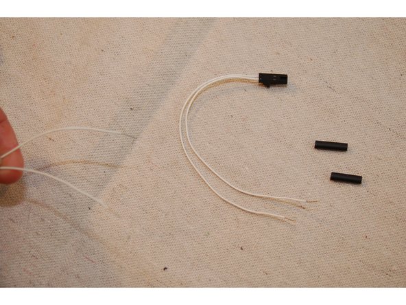 Locate the thermistor leads that are included in the Rambo accessories bag. It's two white wires with a small 2 pin keyed connector on it.