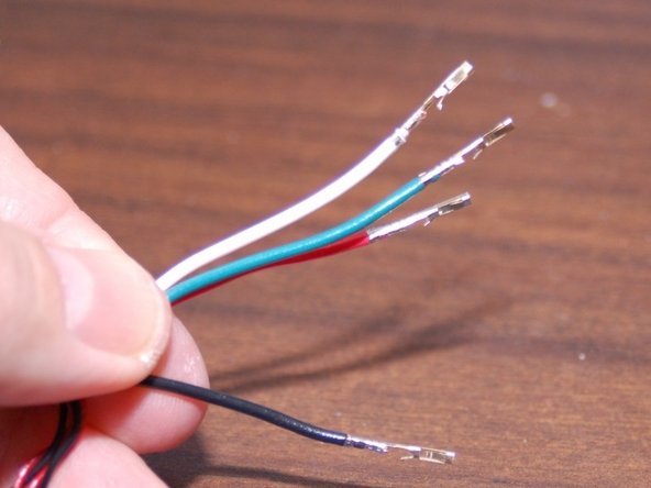 Strip about 1/4&quot; of insulation off of the two power and two thermistor wires coming out of the mesh loom on the Rostock MAX.  Install a female crimp socket on each.