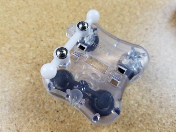 Use two #4 x 1/2&quot; sheet metal screws and two #4 washers to  secure the ball joint bar in place.