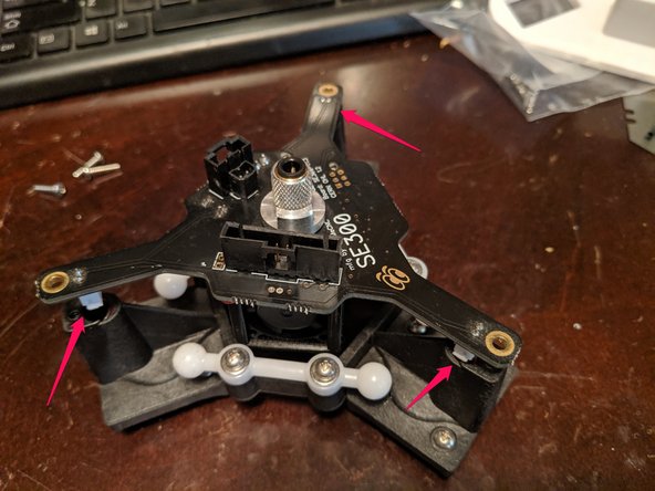 Slightly lift the hotend and this will expose the 3 layer fan plugs as shown in Pic 2.