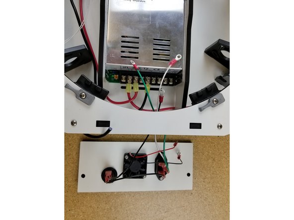Feed the (5) wires from the power panel through the opening in the side of base assembly directly adjacent to the power supply.