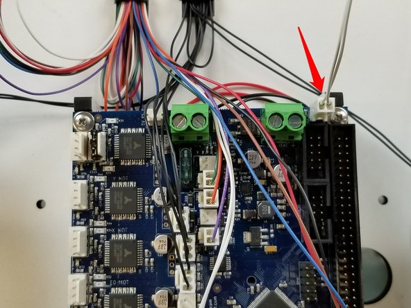 You will want to route those wires as shown. Install a two position terminal housing on the white wires and plug that into Bed Temp. The negative lead for the bed will not get hooked up to anything yet. Later we will connect that wire to a fuse holder.