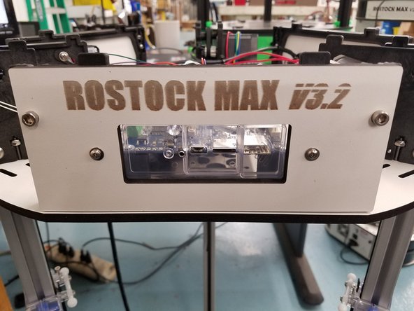 Install the name plate onto the front injection molded side panel. You can adjust the placement of the clear injection molded Duet Cover or your Duet Board to perfectly align the slots for SD card and Reset button.