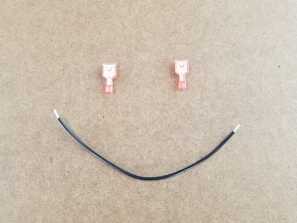 This step will use one short length black wire and two spade connectors.