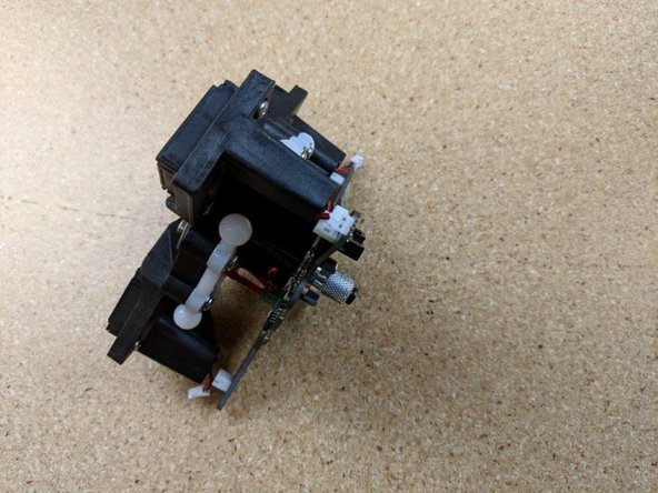 Locate the wires coming out of the platform along with the plug at the end of the PCB.