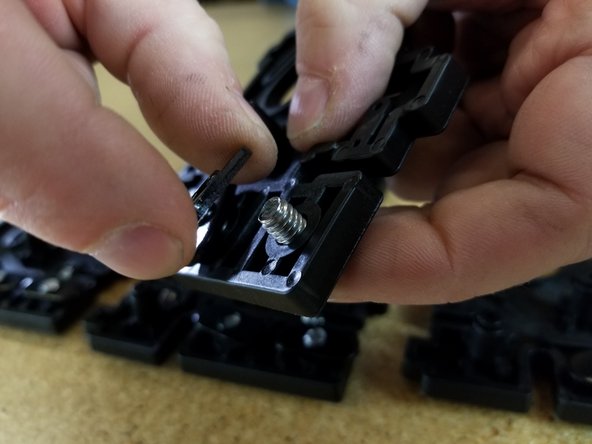 Then install the 1/4-20 button head screws and T-SLOT nuts. Remember to only get the nut started on the screw.