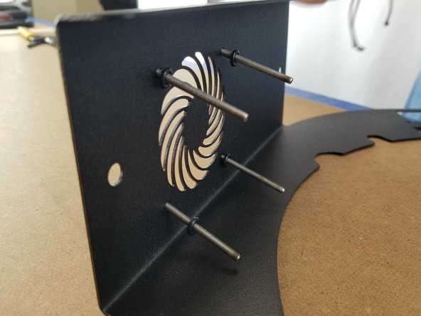 Insert the 4 M3 x 35mm long phillips screws from the outside of the sheet metal and through the 4 holes for the fan.