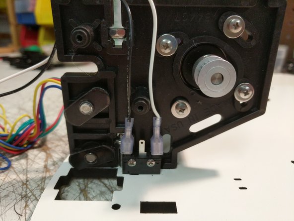 The end stop wires are located in the RAMBo box. They are the black and white wires pre terminated with a blade connector one end and a metal latching connector on the other end. There should be 6 total end stop wires.