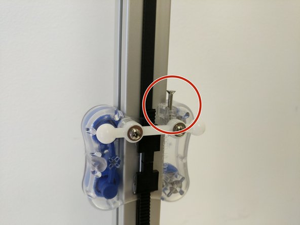 Align the ball joint with the posts on the inside of the carriage and press on. You should attempt to evenly press the ball joint onto the carriage.