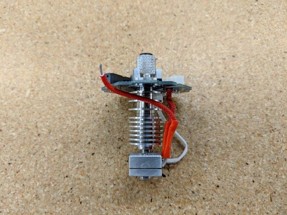 Trim the second lead so that it extends past the PCB by about 6mm when in the position shown.