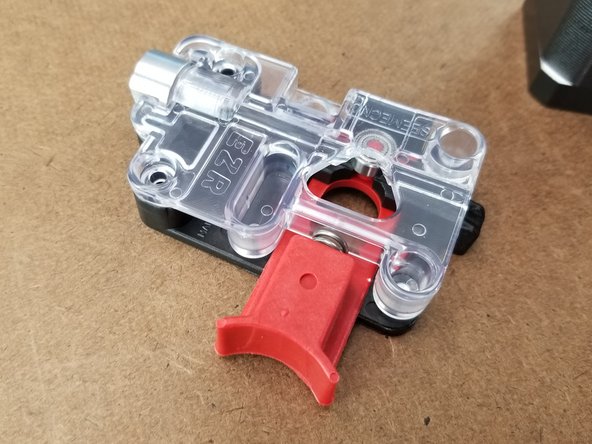 First you will want to cut and remove the zip tie holding together the ezr struder as shown in Pic 2.  Discard the zip tie.