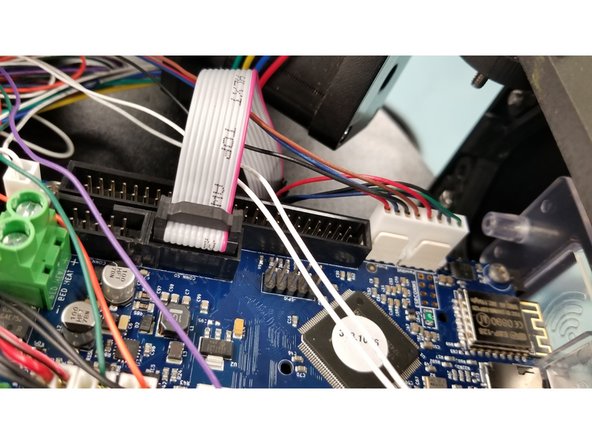 Plug the cables into the Duet board as shown, and replace the top hatch on your printer.