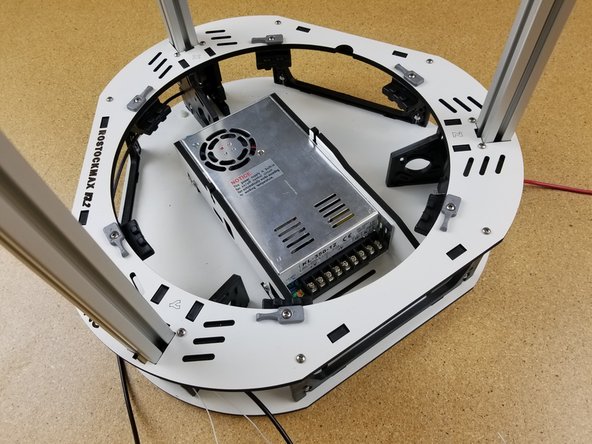 You will now install the remaining two towers just as you did the Z tower. Begin with the Y tower, which has the white thermistor wires run through the center hole.