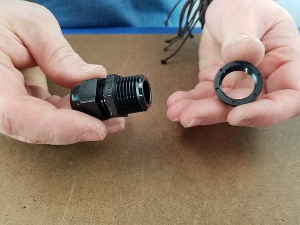 Remove the nut from the Cable Mount Hub as shown in Pic 2.