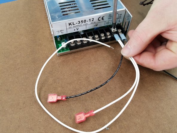You will use the 2 white wires that were combined and made earlier.