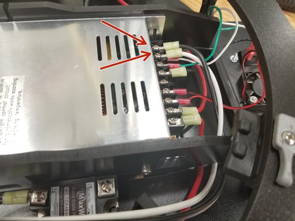 Strip 1/4&quot; off the white and black wires included in the kit, and crimp one ring terminal to one end of the white wire, and one ring terminal to each end of the black wire.