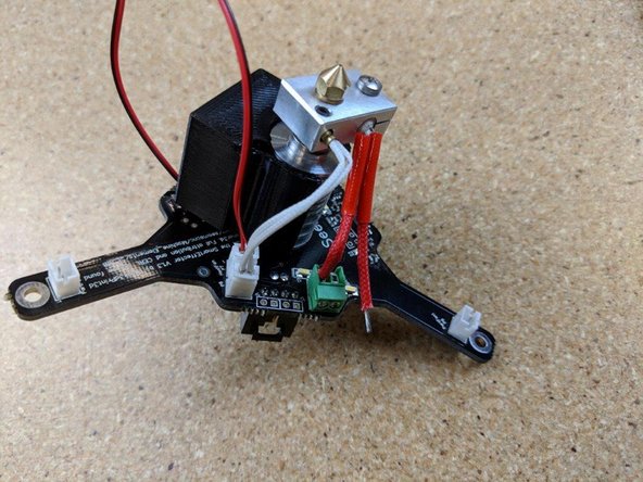 Insert one of the wires into the green terminal block as shown in Pic 1 ensuring that no stray wires are sticking out.  Using a small screwdriver secure the wire into the block and tighten securely.