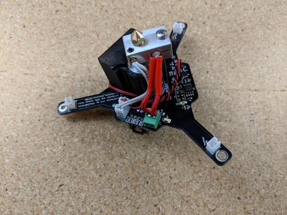 Bend the thermistor wires behind the heater wires to keep them in place and out of the way.