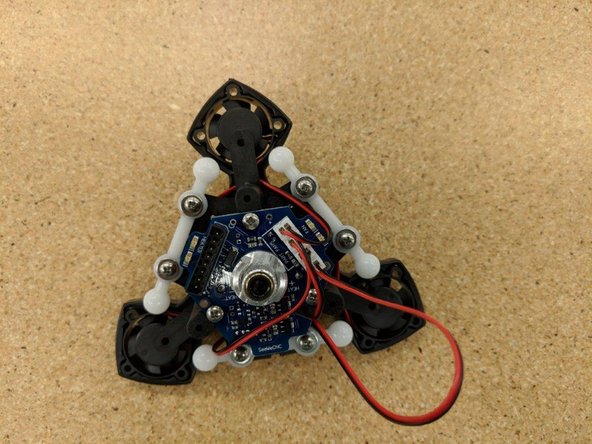 As you connect each fan wire, route the wire as shown in the photos.