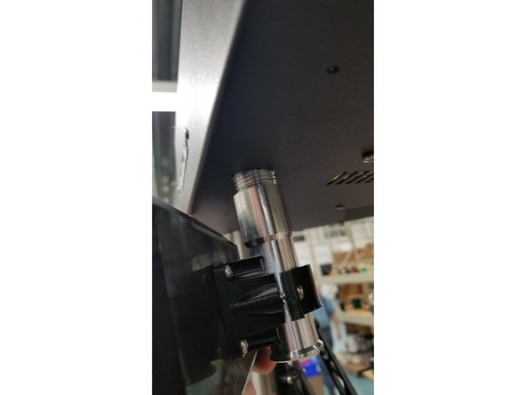 Pass the cables through the screen arm assembly and post mounting hole as shown.