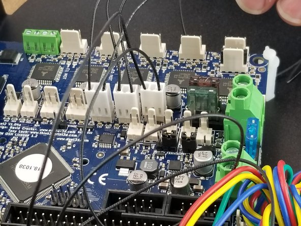 The Z motor bracket is the one next to the Duet on the side of the large black connector on the Duet.