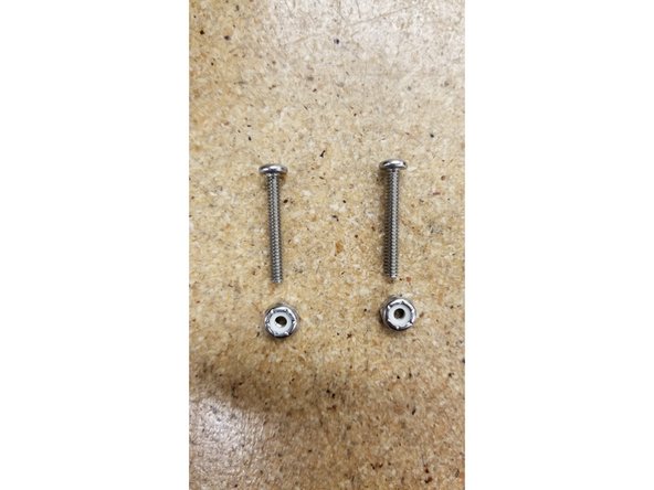 Locate the two 6-32 nylon lock nuts  and 1" L machine screws.
