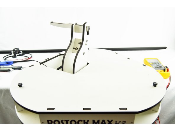 Remove the spool holder arms.