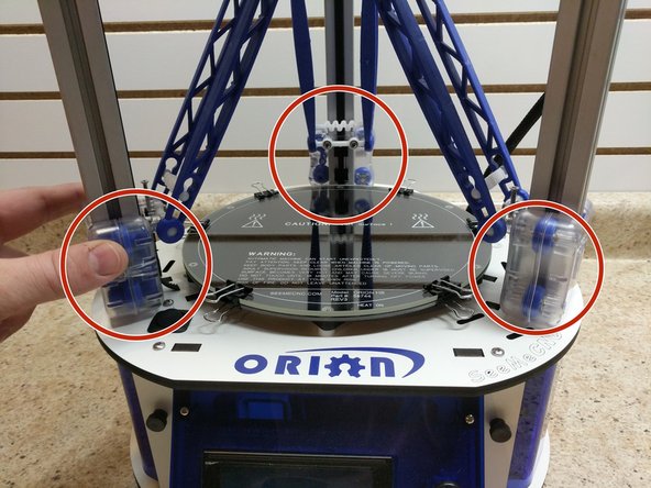 Try to hold the glass plate by the edges not touching the surface of the glass plate. Oils on the glass plate will make it more difficult for prints to stick.