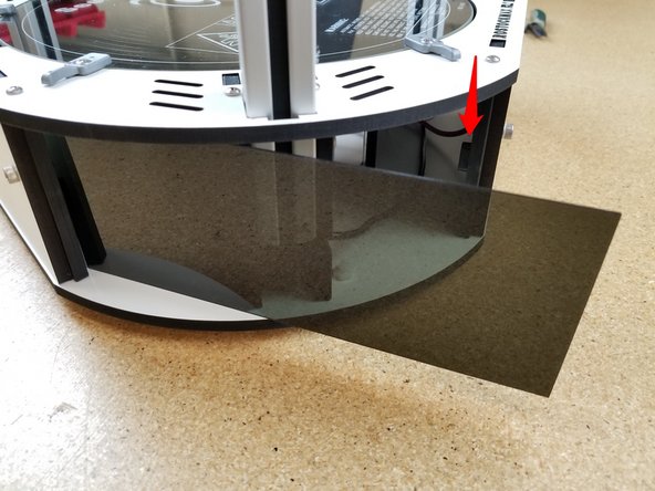 Remove the paper backing from both sides of the acrylic panels.