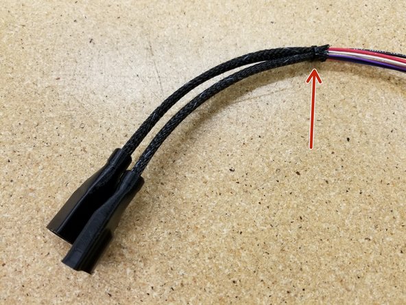 Zip tie the two cable bundles together at the top of the mesh looms as shown.