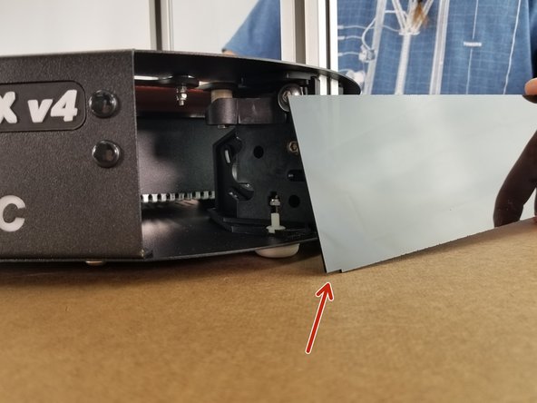 Take the remaining 3 acrylic corner covers and remove the protective tape from them.