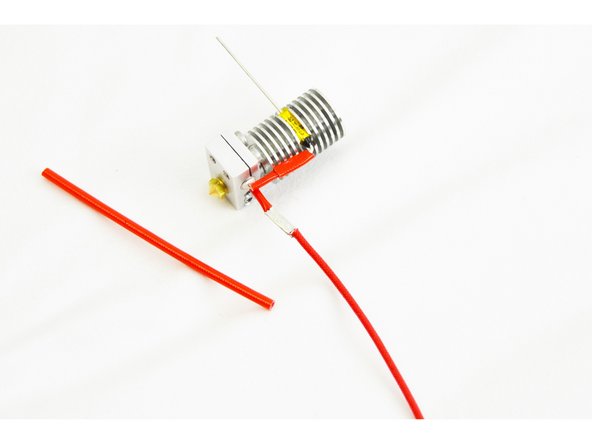 Install one of the reminaing 18mm pieces of Red Silicone High Temp Insulation over the connection that was crimped in the previous step.