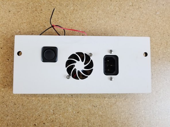 The rocker switch comes with a nut to secure it to the plate.