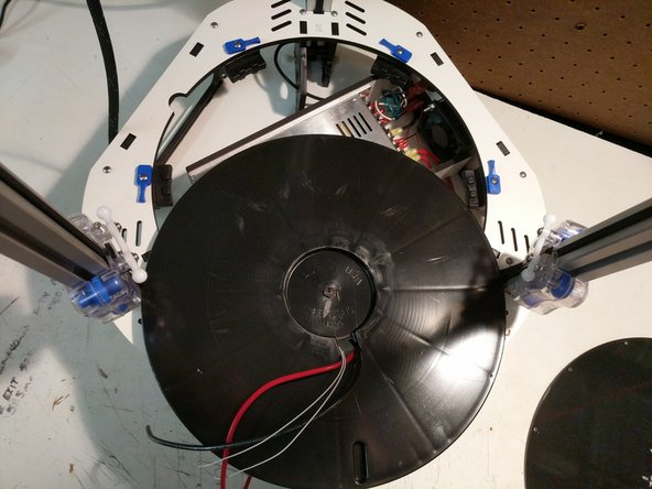 Flip the bed insulator over and pull the wires through.