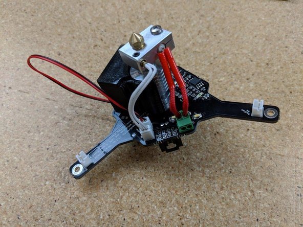 Insert the second wire as the previous again ensuring there are no stray strands of wires .  Again using a small screwdriver secure the wire into the terminal block.