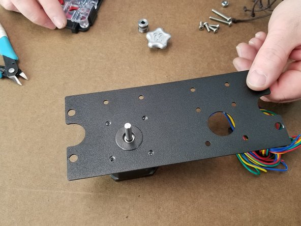 With the extruder lined up in the pic, have the wires of the motor oriented to the middle of the plate facing inwards as shown in Pic 1.
