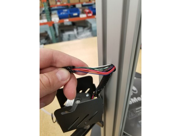 Pull the whip wires from the tower. Be careful here so you can keep the wires for any future needs.