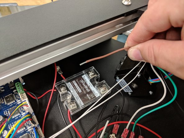 The brown wire exiting the Z tower with NO connector on it will install in the only empty clamp on the relay.