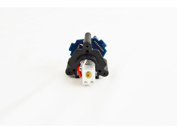 Align the hotend with the PCB mount as shown in the image and gently slide it in place.