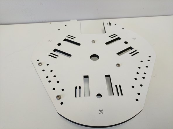 The board supports should NOT be on the side of the base assembly base plate with the XYZ indicators.